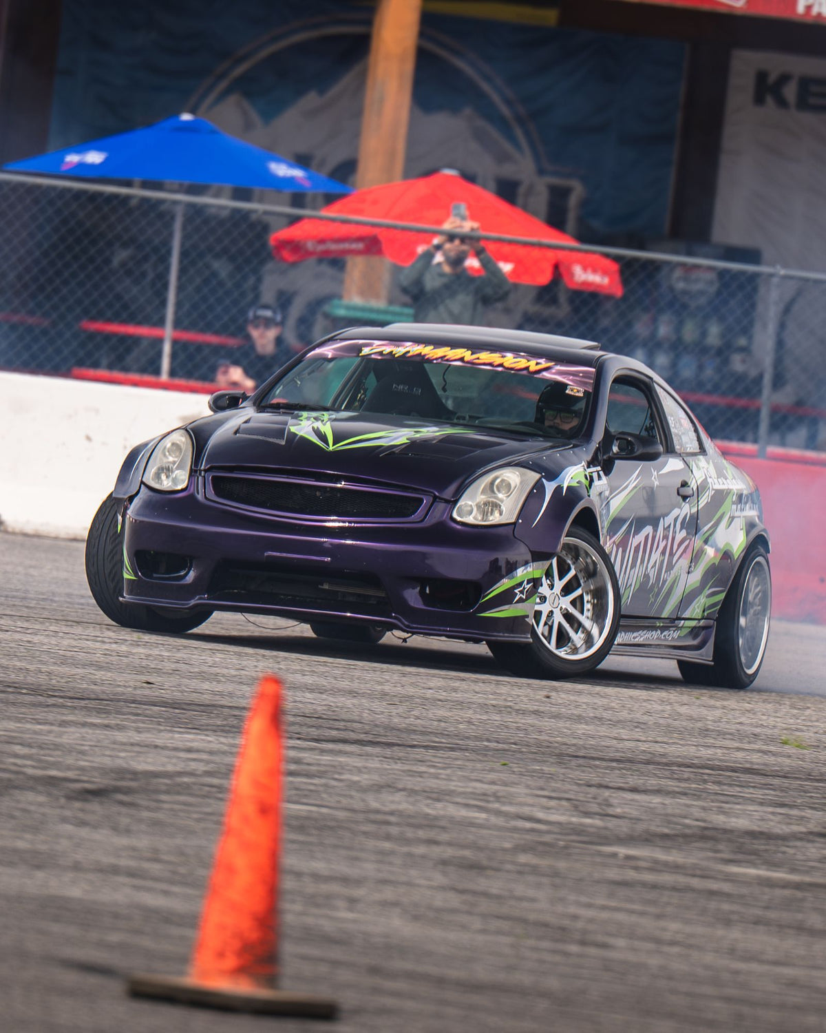 Initiate Motorsports G35 drifting toward a cone